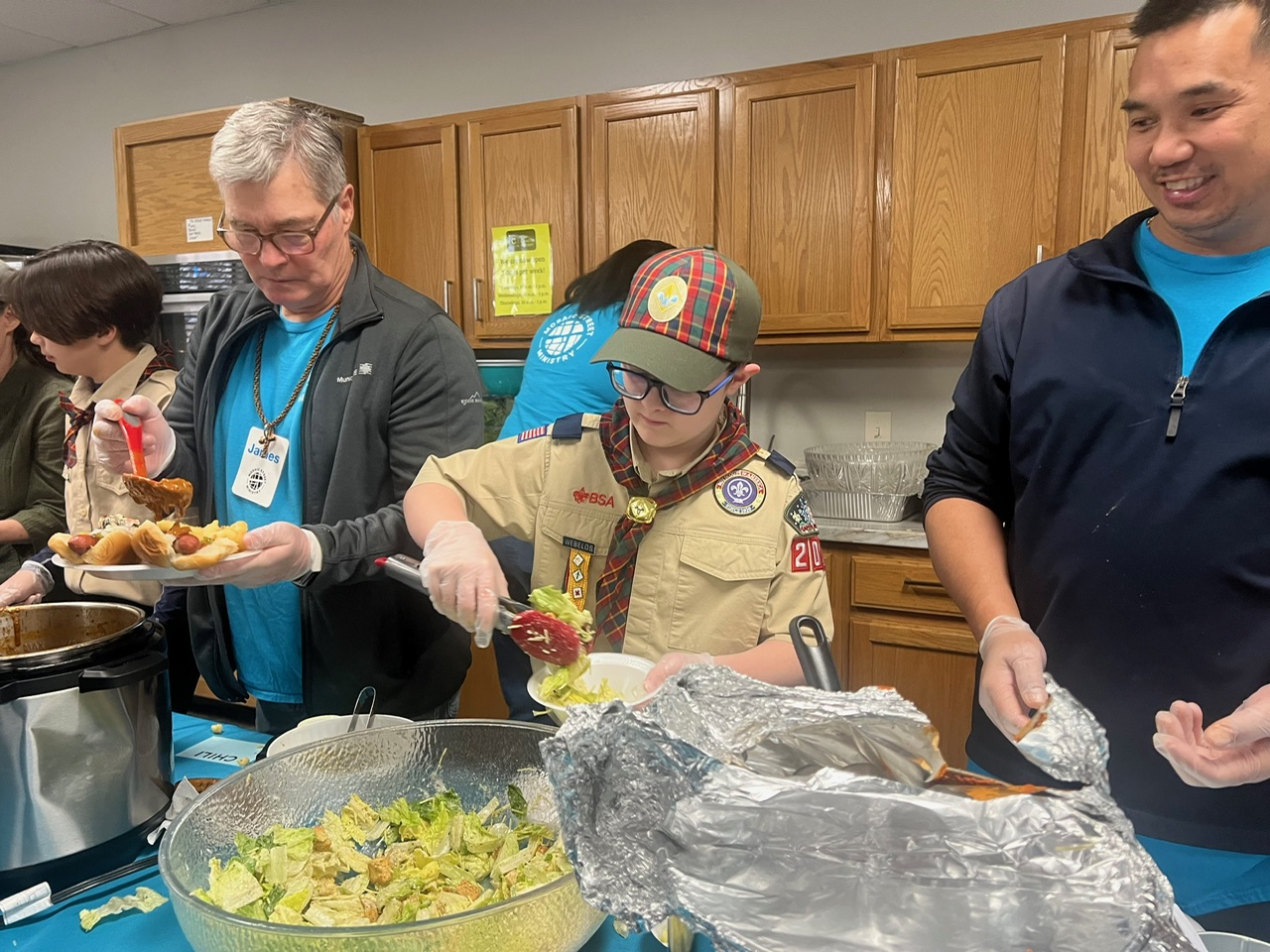 Scouts serving people in need